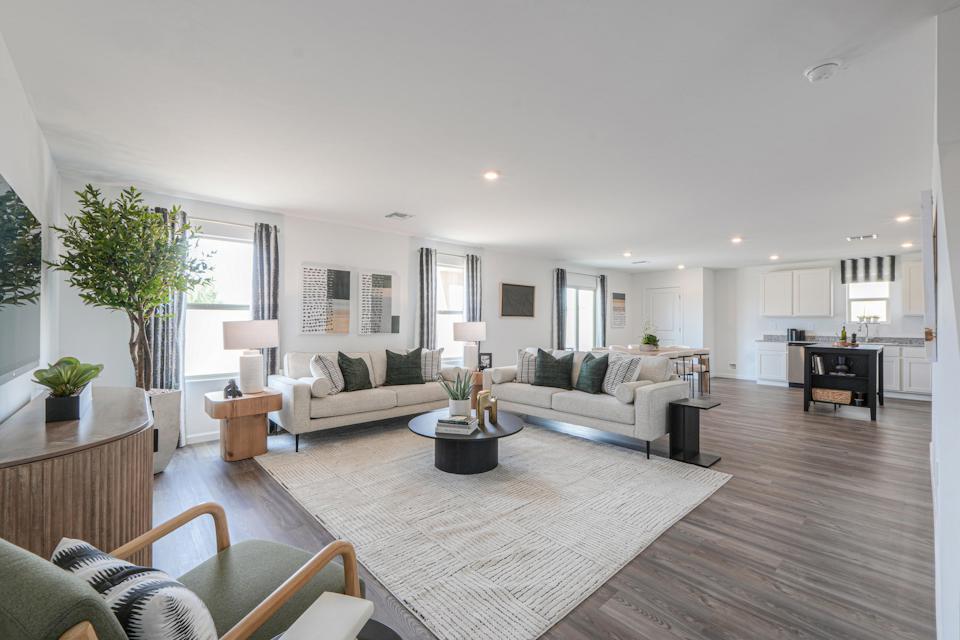 A living room with a fireplace.