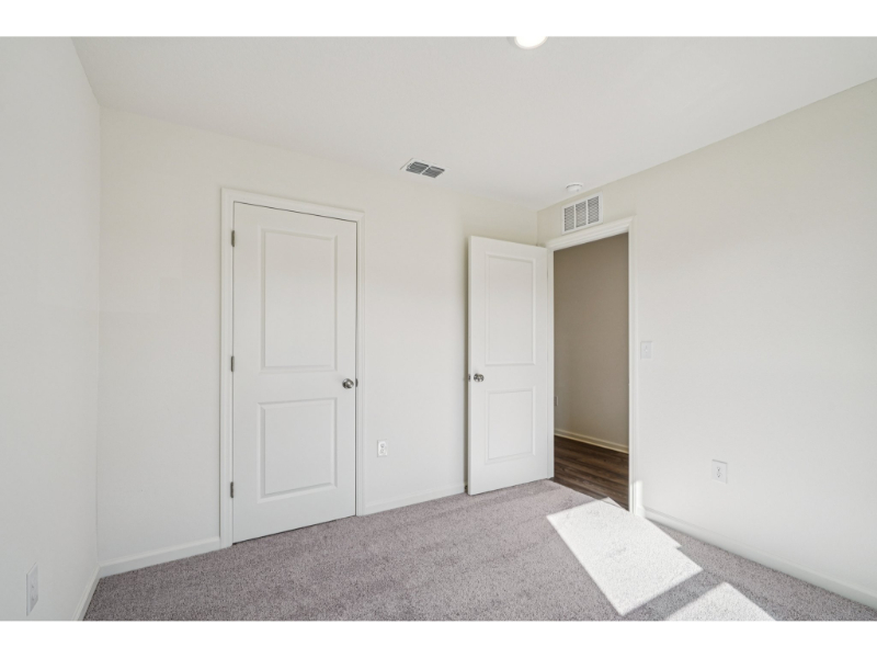 A room with white doors.