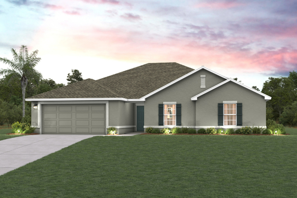 A house with a green lawn.