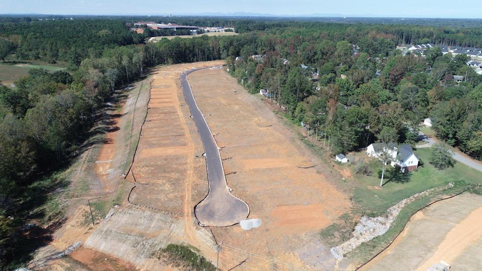A road with trees on the side.