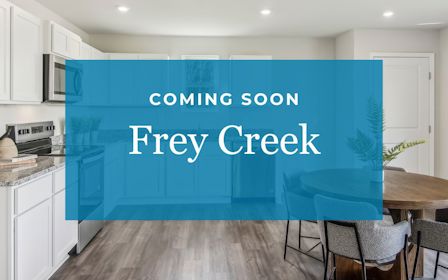 A kitchen with blue cabinets.