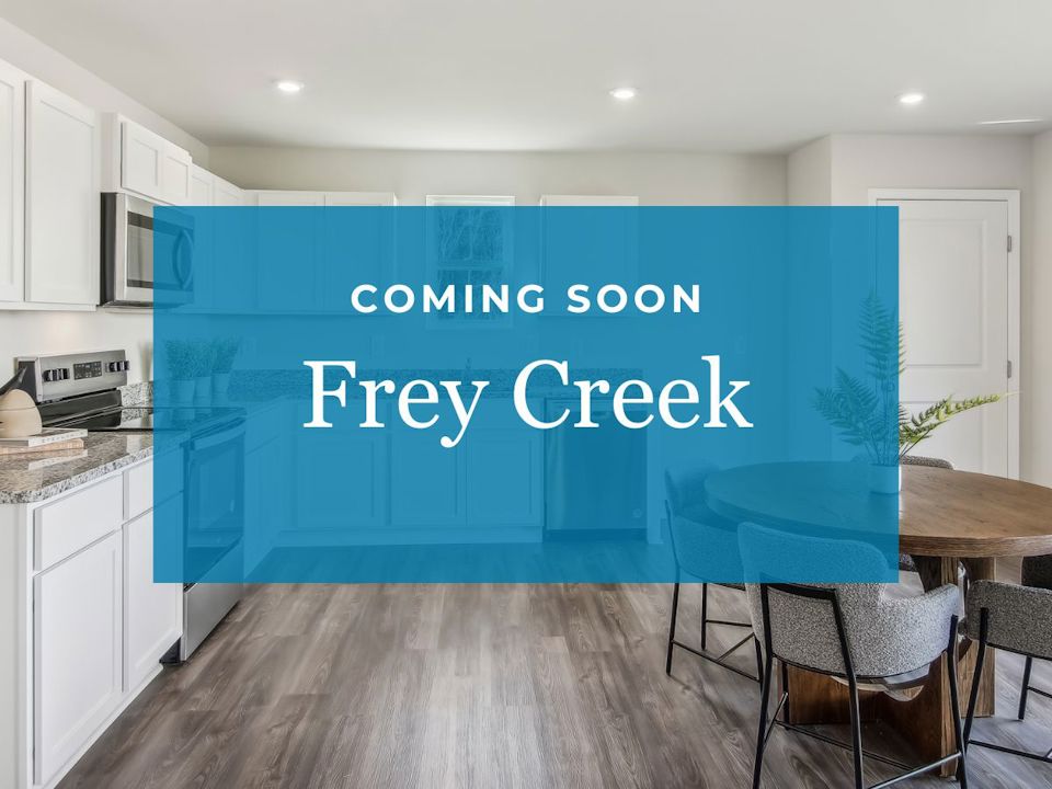 A kitchen with blue cabinets.