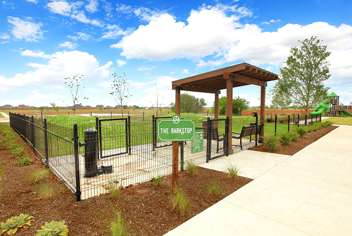 A sign on a sidewalk.